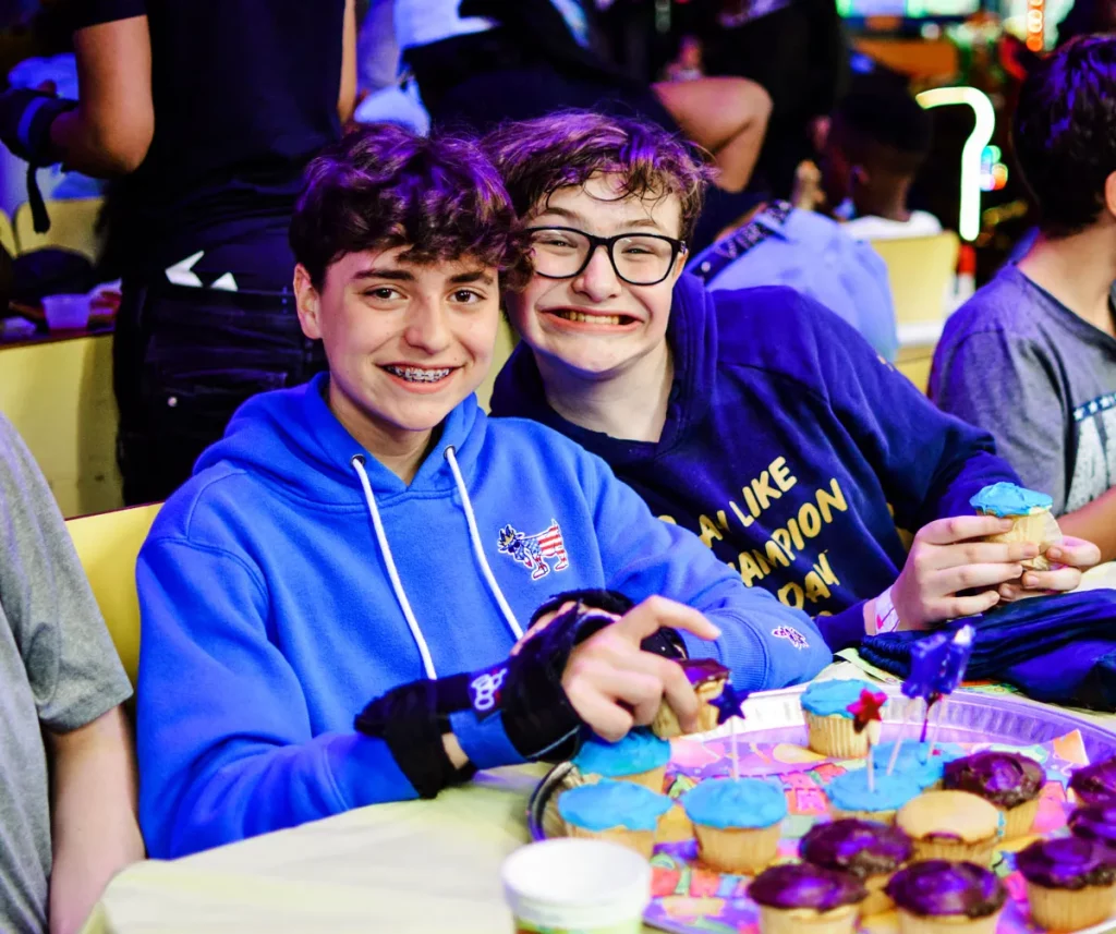birthday teen two boys with cupcakes